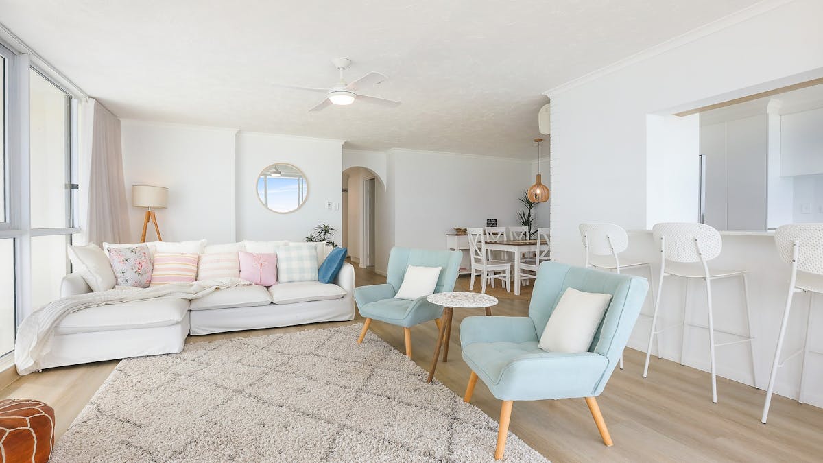 Lounge room connecting to dining room, open plan living, seacrest apartments in surfers paradise