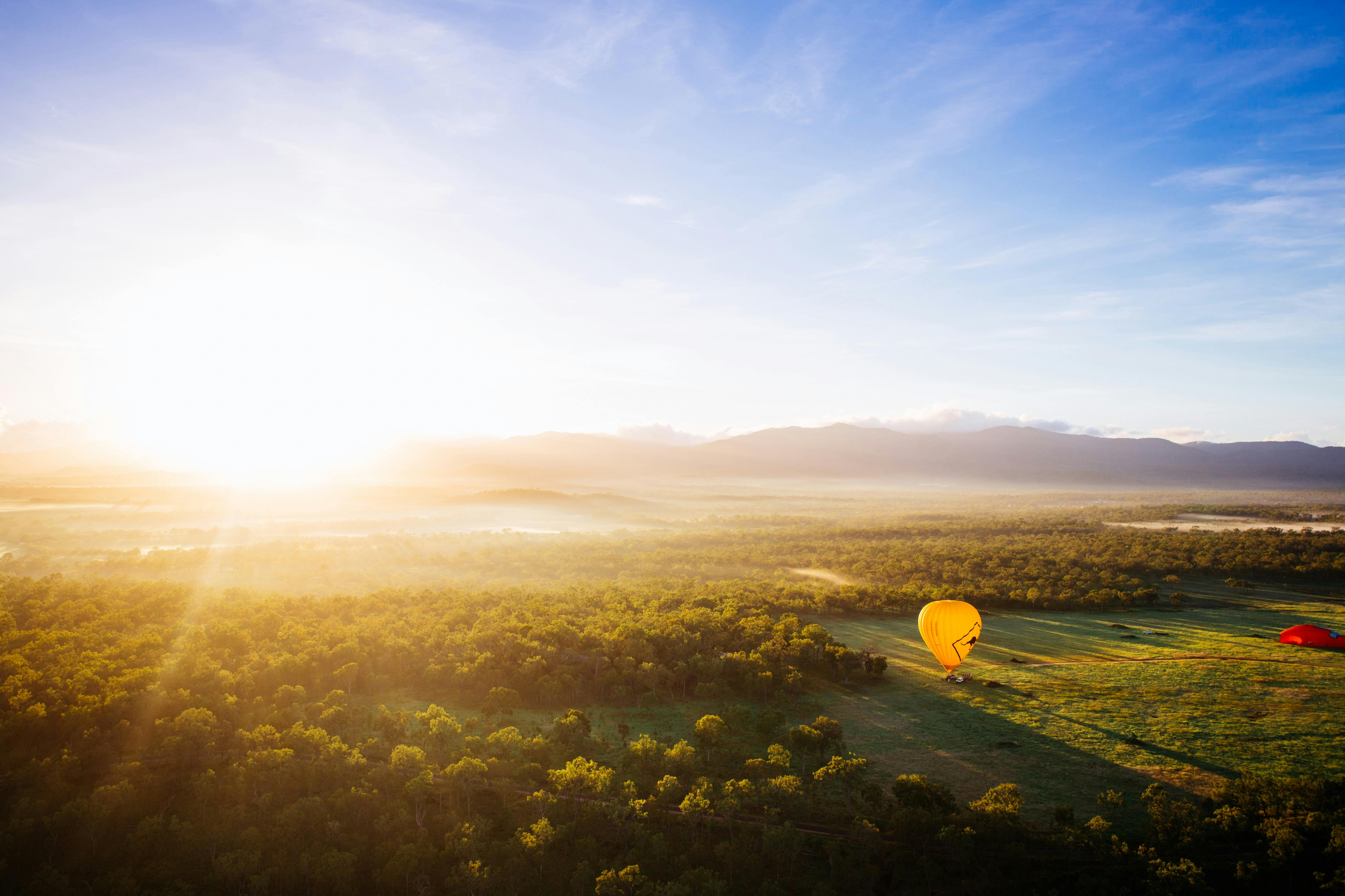 Hot air balloon over farmland