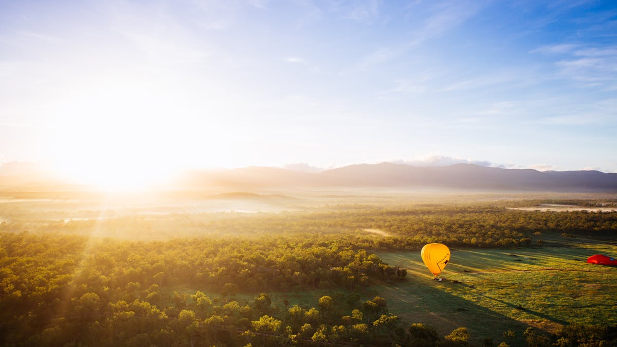 Hot air balloon over farmland