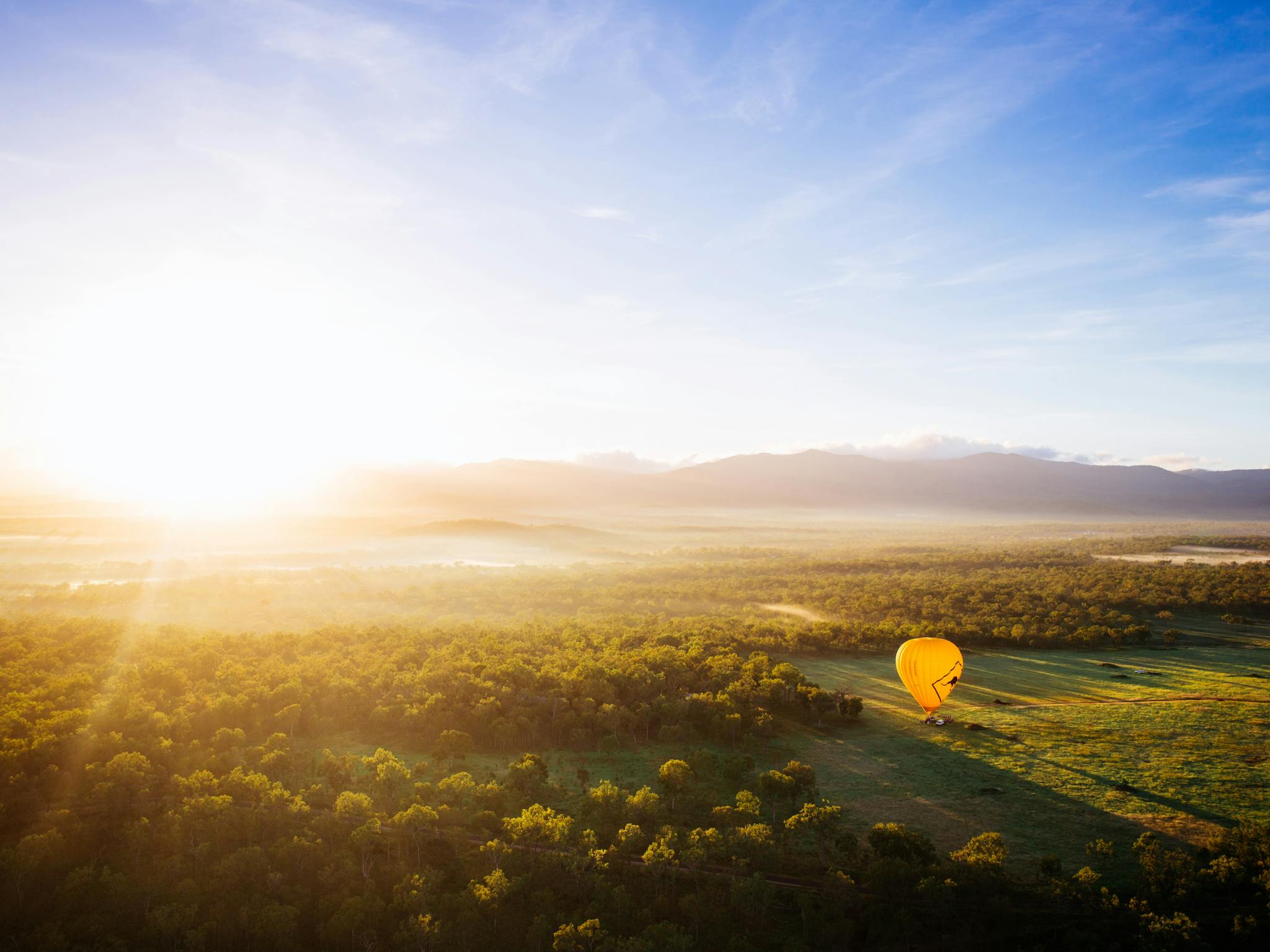 Hot air balloon over farmland Hot air balloon over farmland