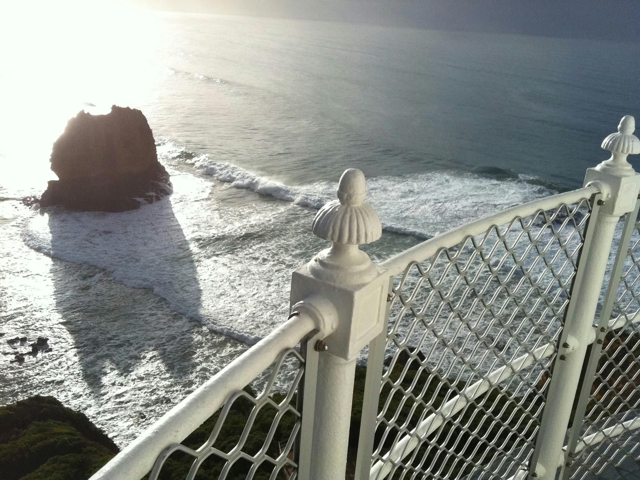 A view from the balcony of Split Point Lighthouse in the morning, overlooking Eagle Rock