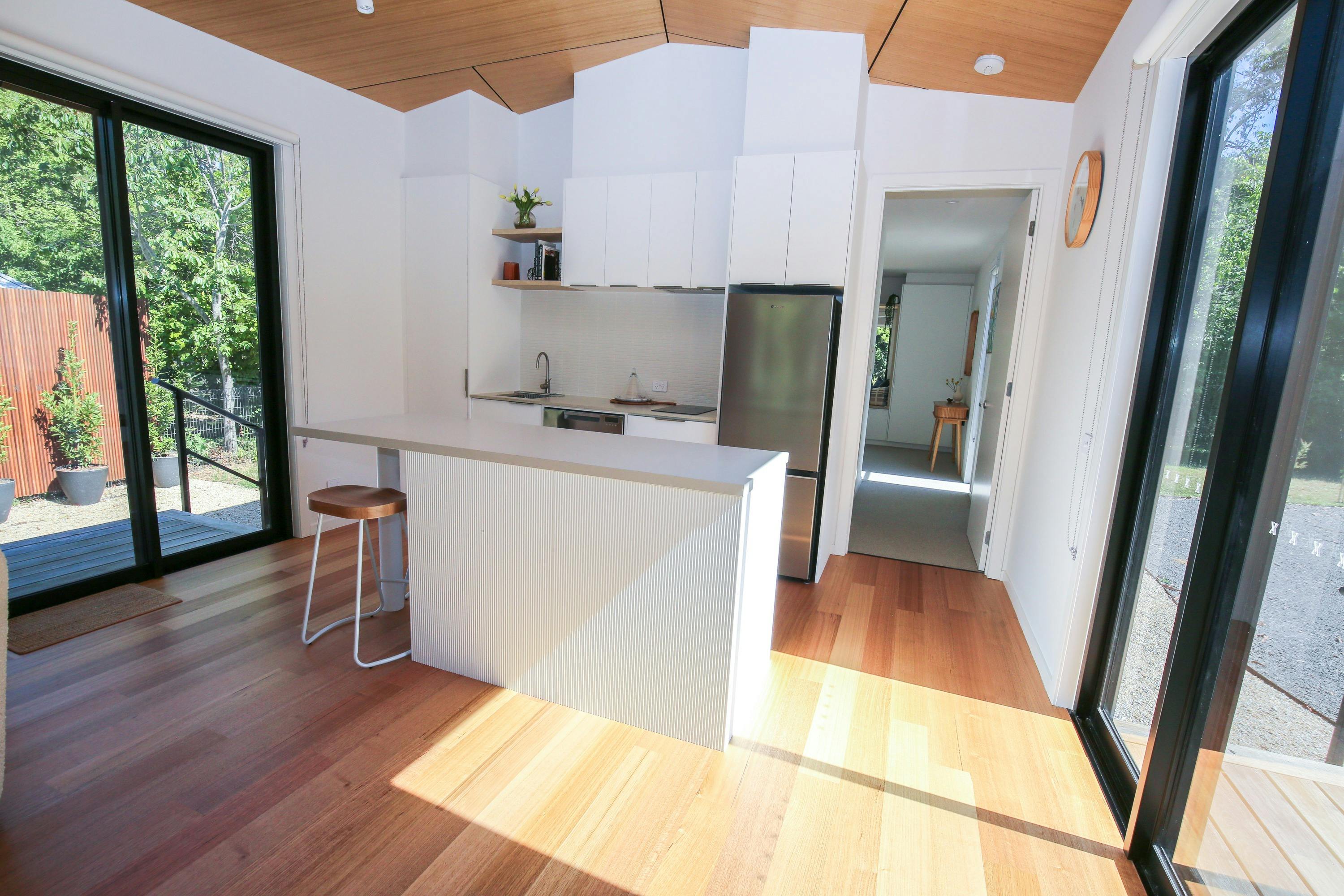 Kitchen space with countertop and refrigerator
