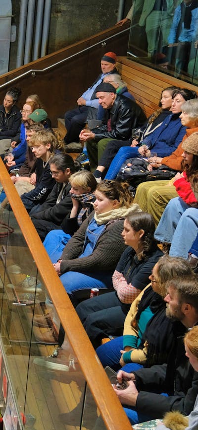 Crowds watching glassblowing