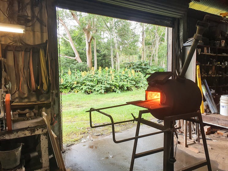 View of the forge and trees.