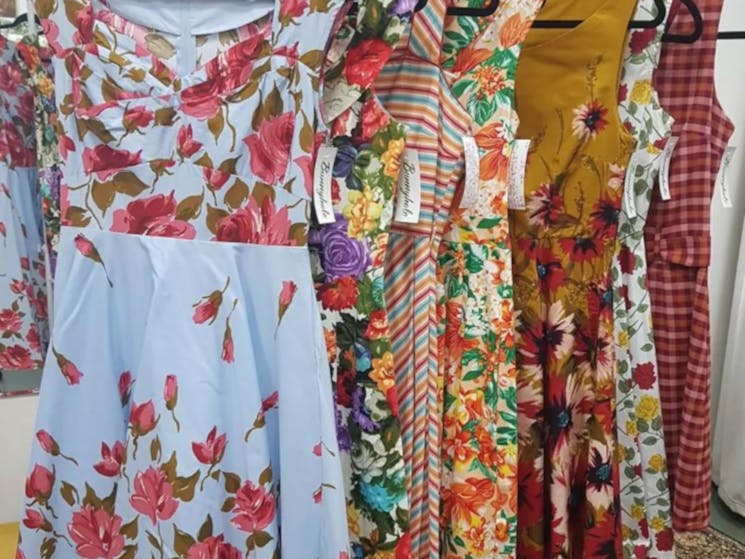 colourful dresses hanging up