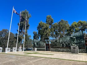 Statue, backdrops and flags flying at Shepparton Cenotaph