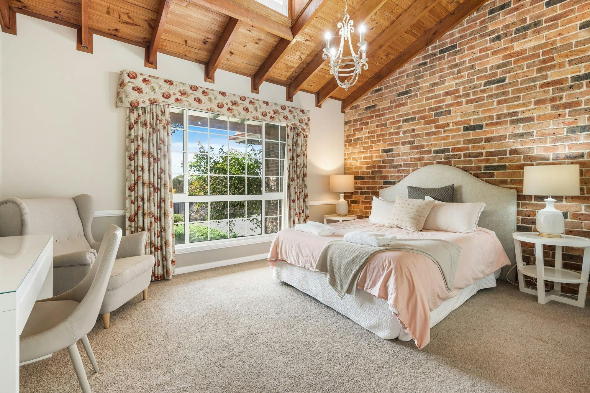 Queen bed with garden views