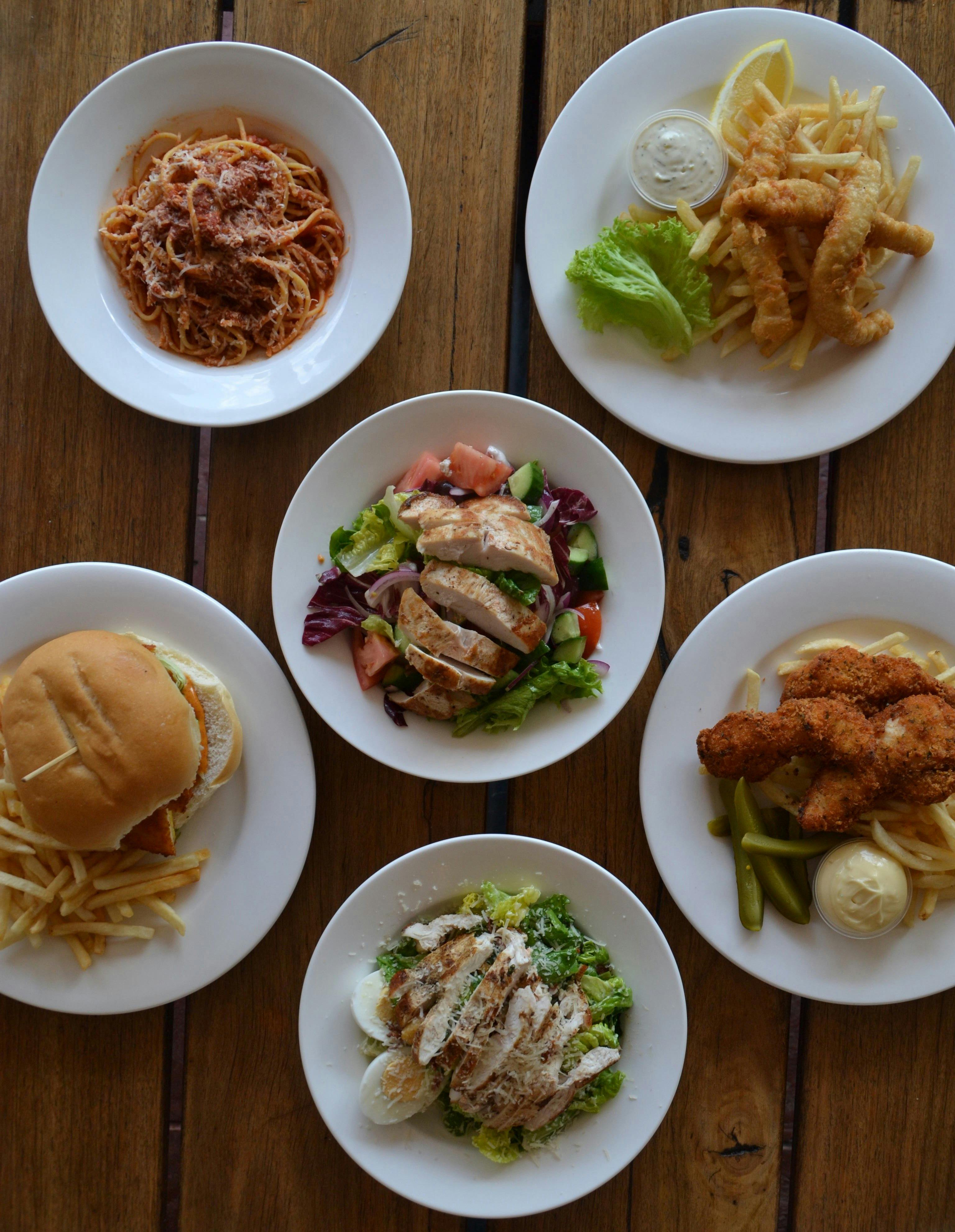 You can enjoy a range of classic meals including crumbed chicken tenderloins, burgers and fish and c