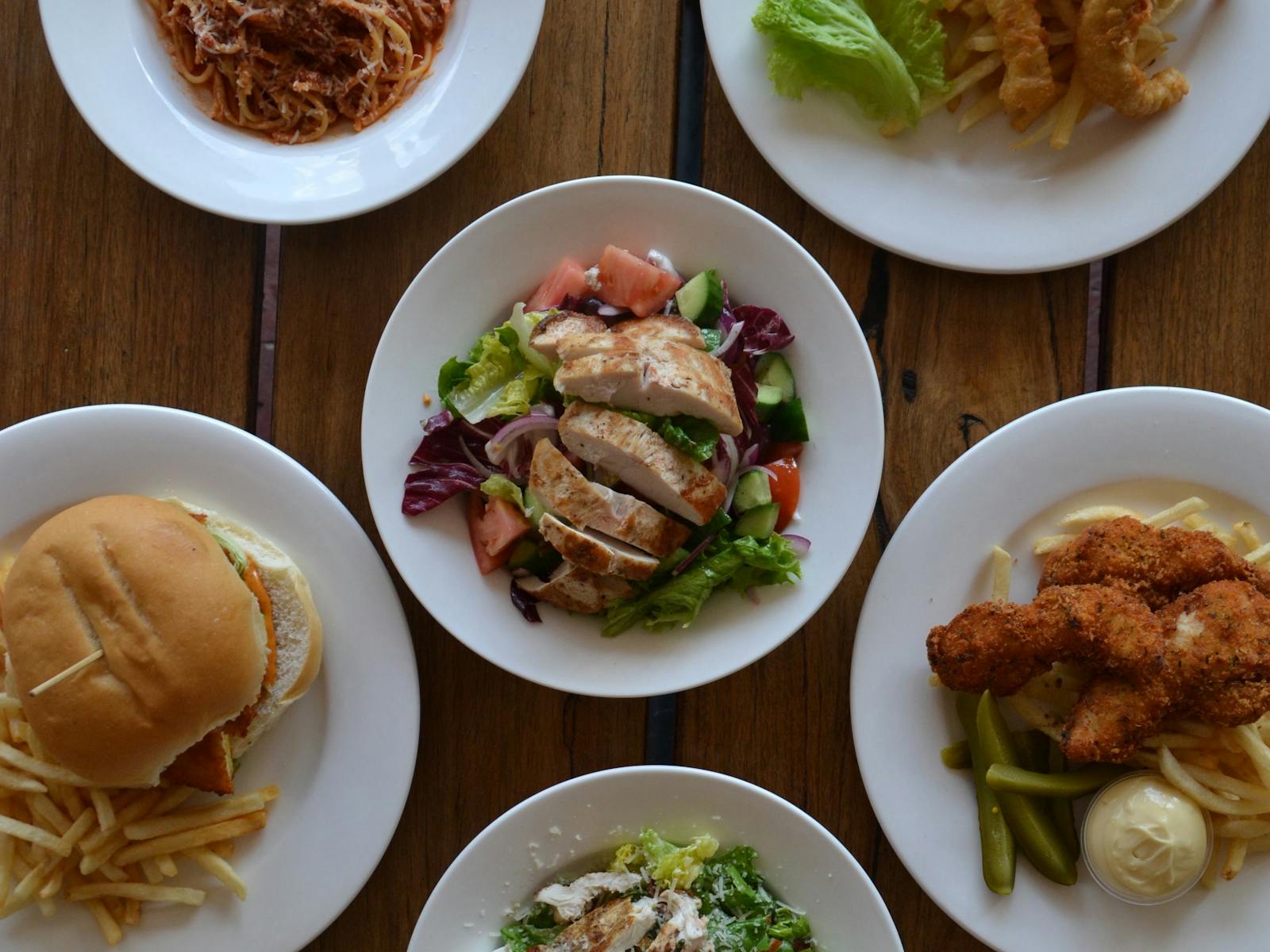 You can enjoy a range of classic meals including crumbed chicken tenderloins, burgers and fish and c