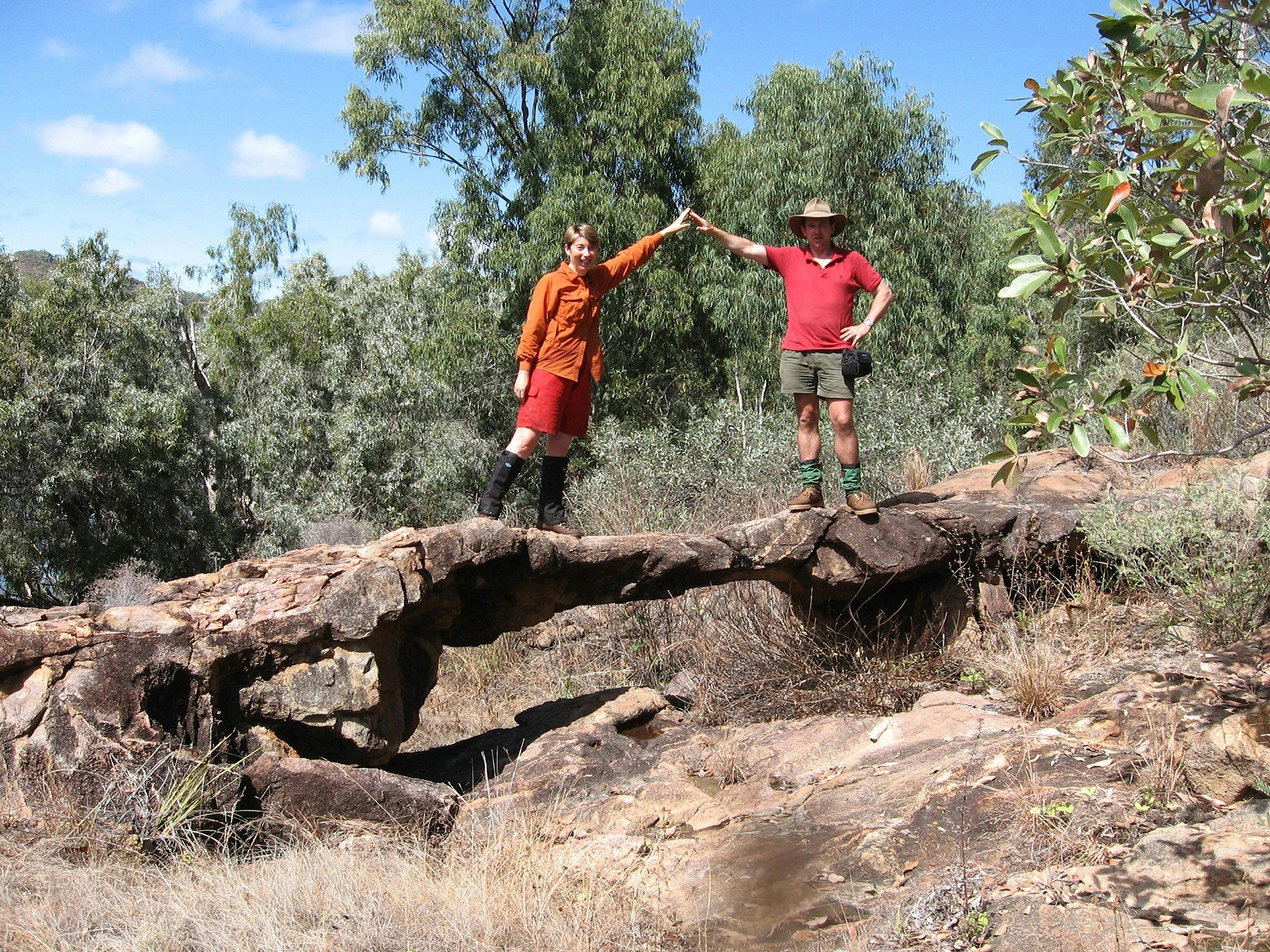 Richard and Melanie posing at geological curiosity named London Bridge during a Kennedy Retrace (24