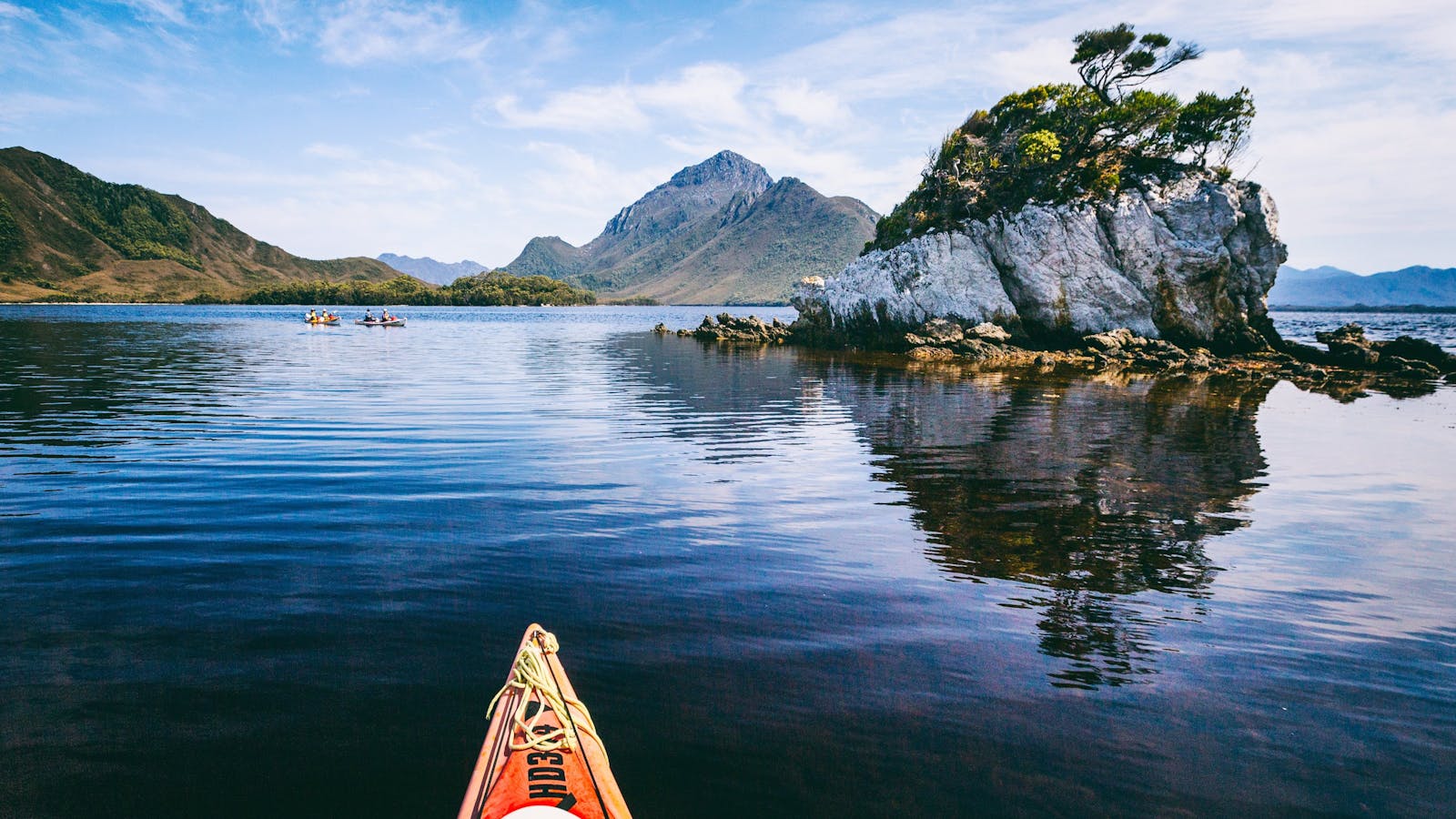 Kayaking on Bathurst Harbour, Southwest Tasmania