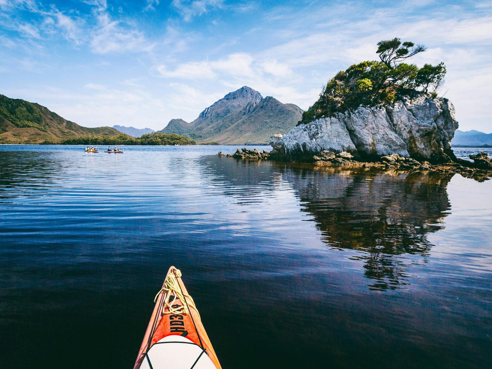 Kayaking on Bathurst Harbour, Southwest Tasmania