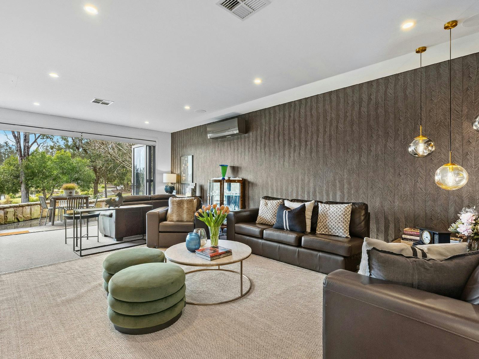 Hunter Villa lounge room with views overlooking the 12th tee