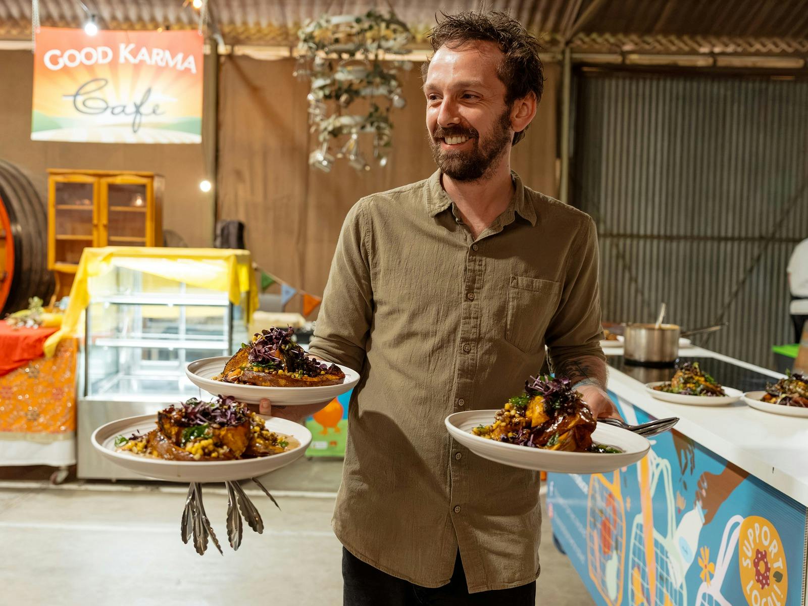 Aaron Hutton serving seasonal dishes at the Long Lunch.