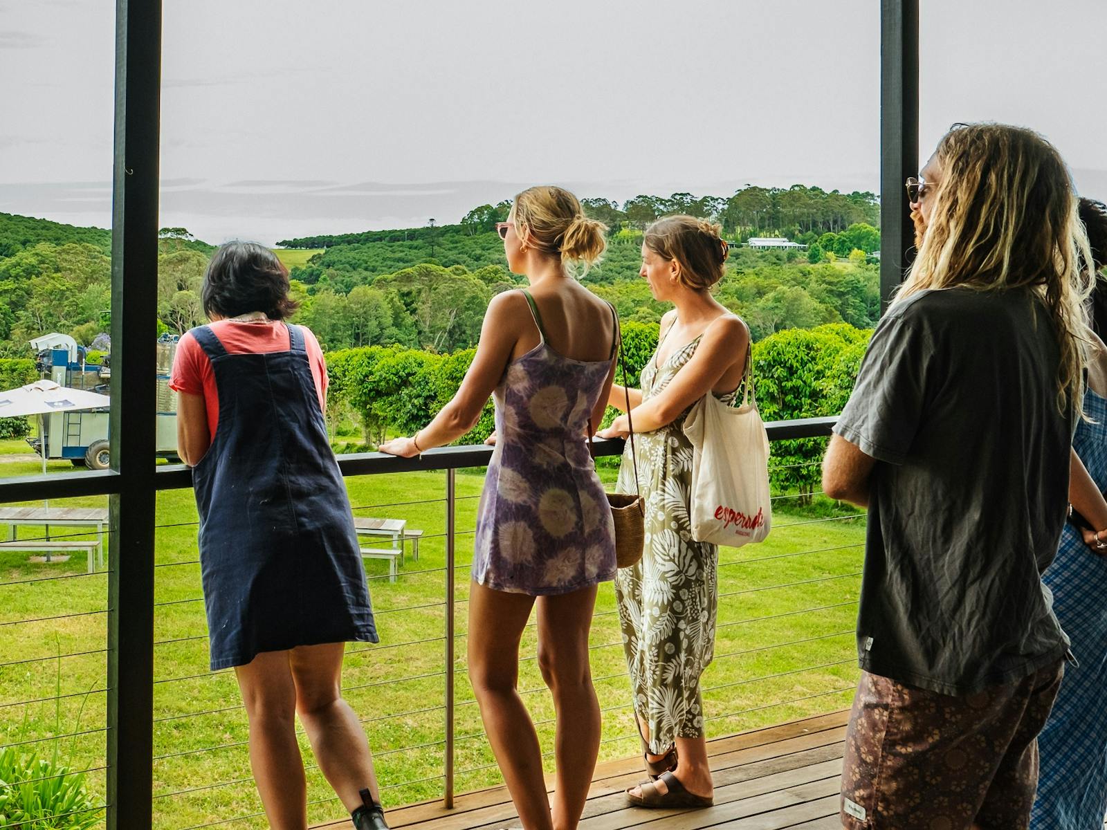 Visitors on Zentveld's Coffee farm verendah.