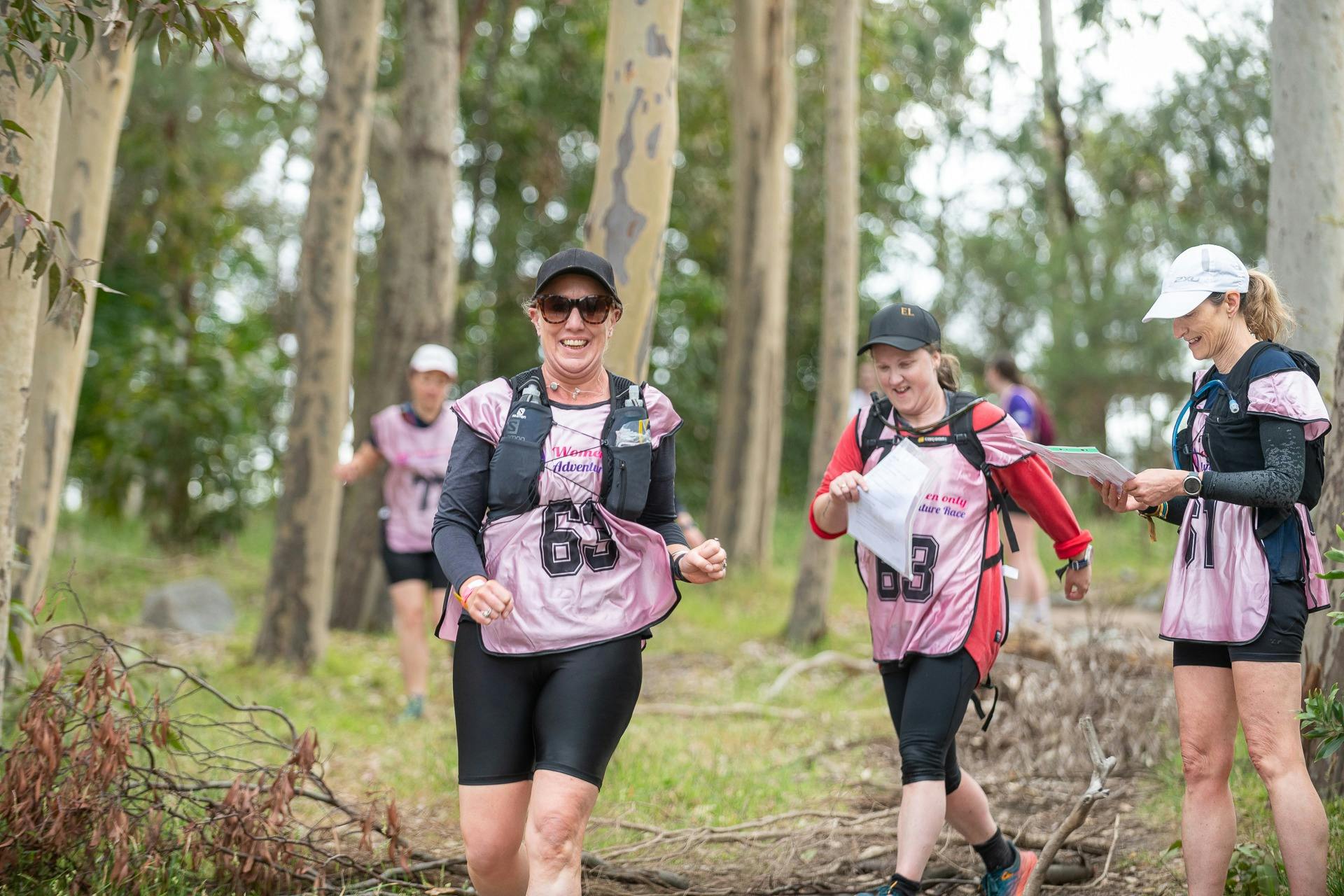a team is running at the Women Only Adventure Race