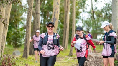 a team is running at the Women Only Adventure Race