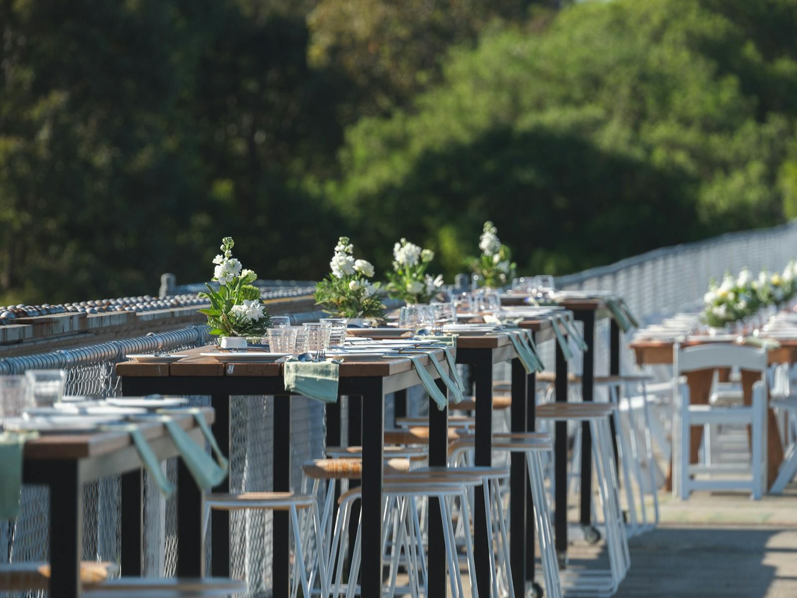 Tables are set for a long lunch on the old Nicholson River Railway Bridge