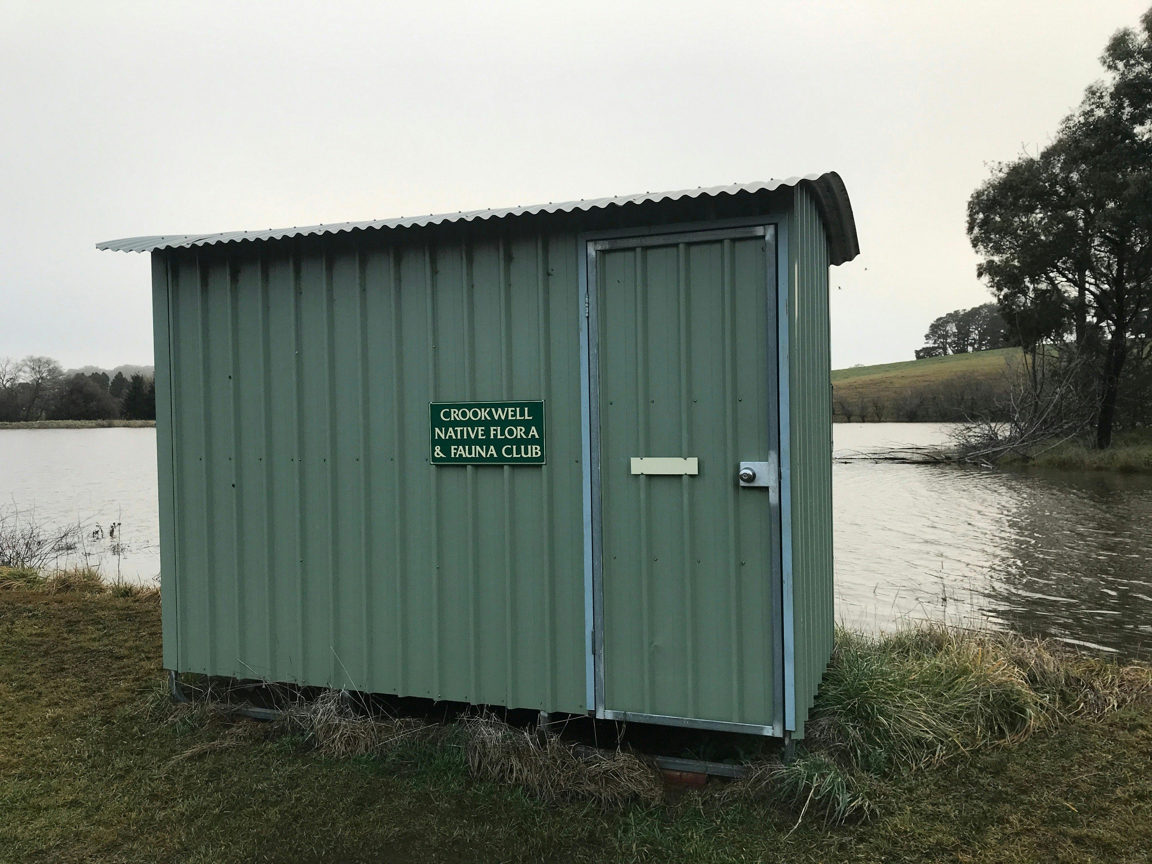 The bird hide overlooks a large dam that teems with water fowl