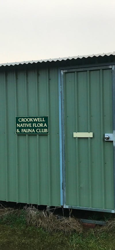 The bird hide overlooks a large dam that teems with water fowl