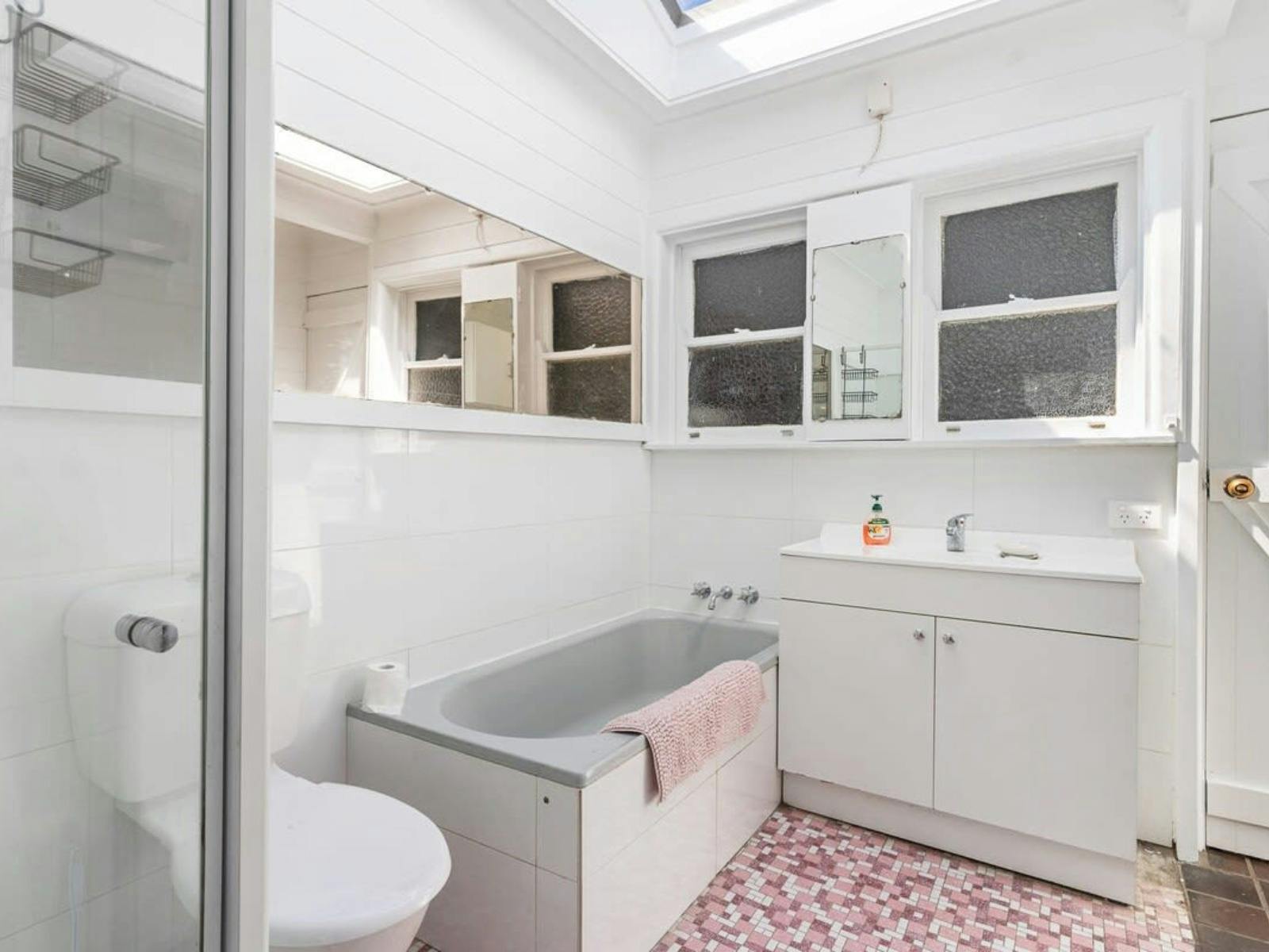 Main Bathroom with bath, shower and vanity