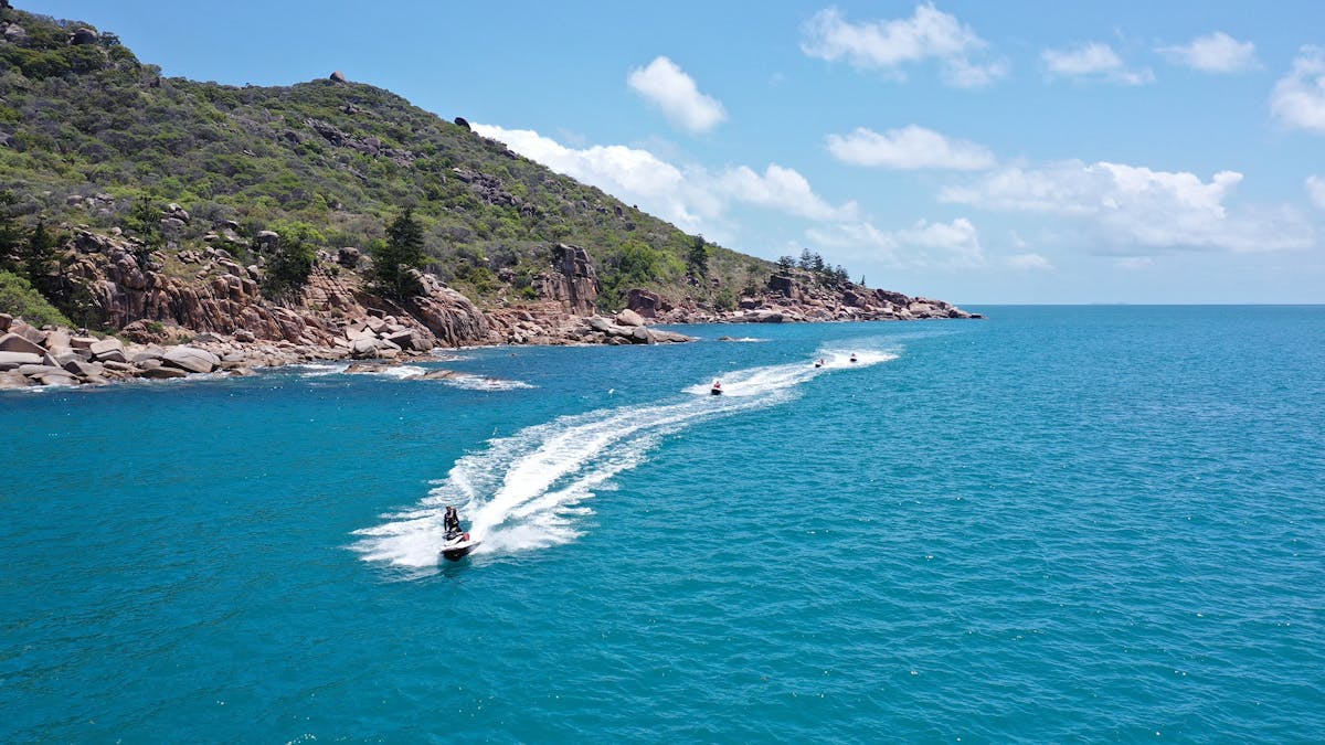 Guided Jet Ski tour cruising the Island's coastline