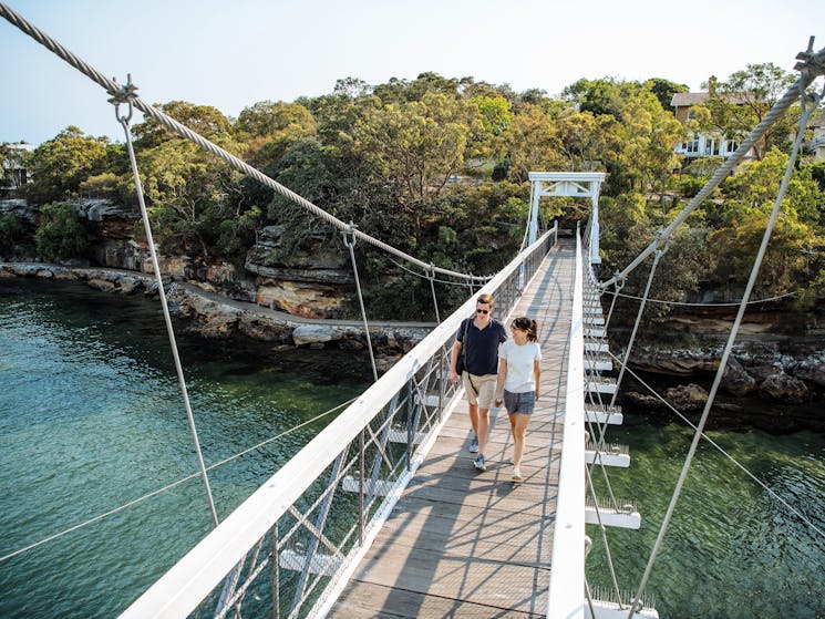 Couple enjoying a scenic walk around Parsley Bay, Vaucluse