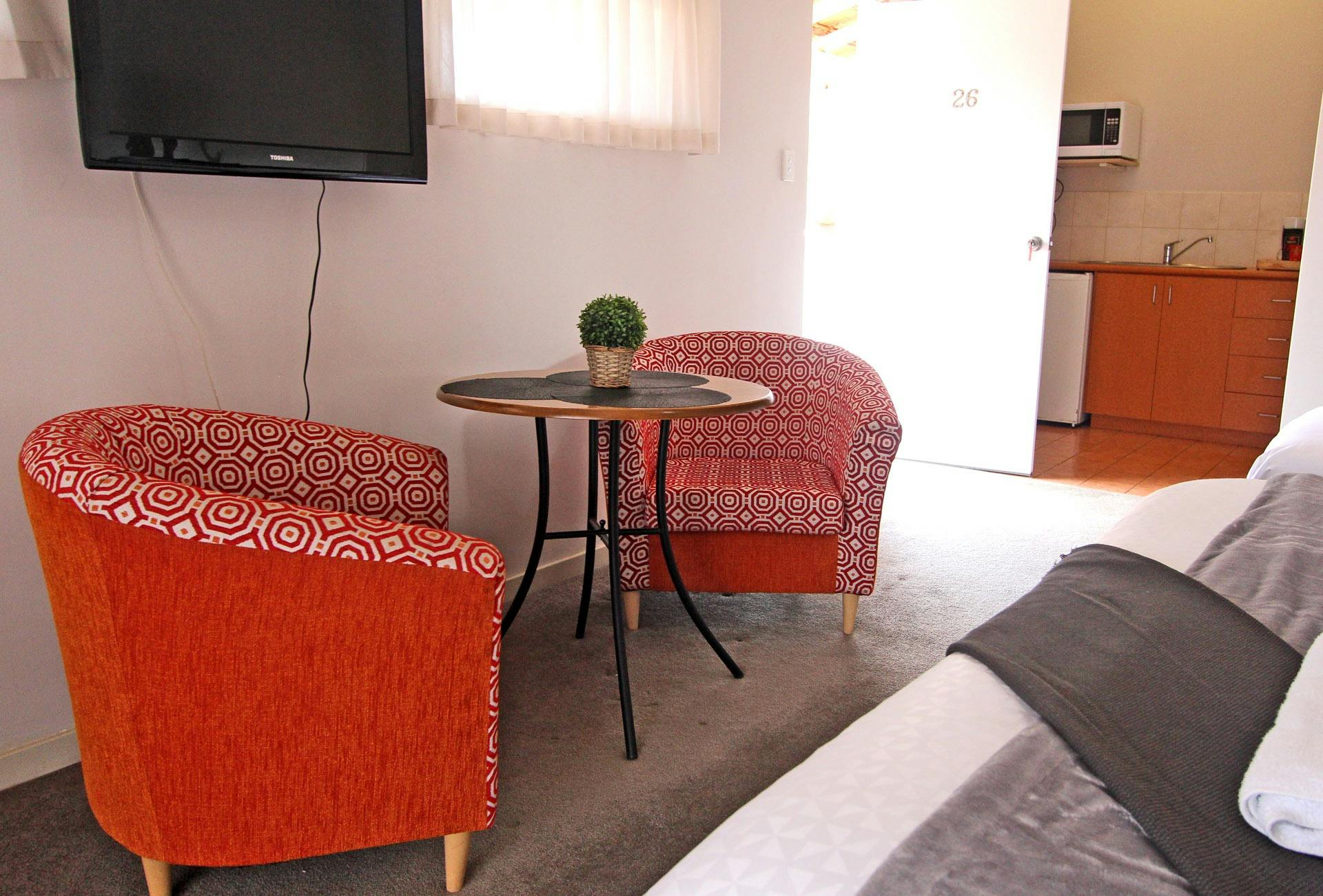 Dining, entertainment, seating and kitchenette