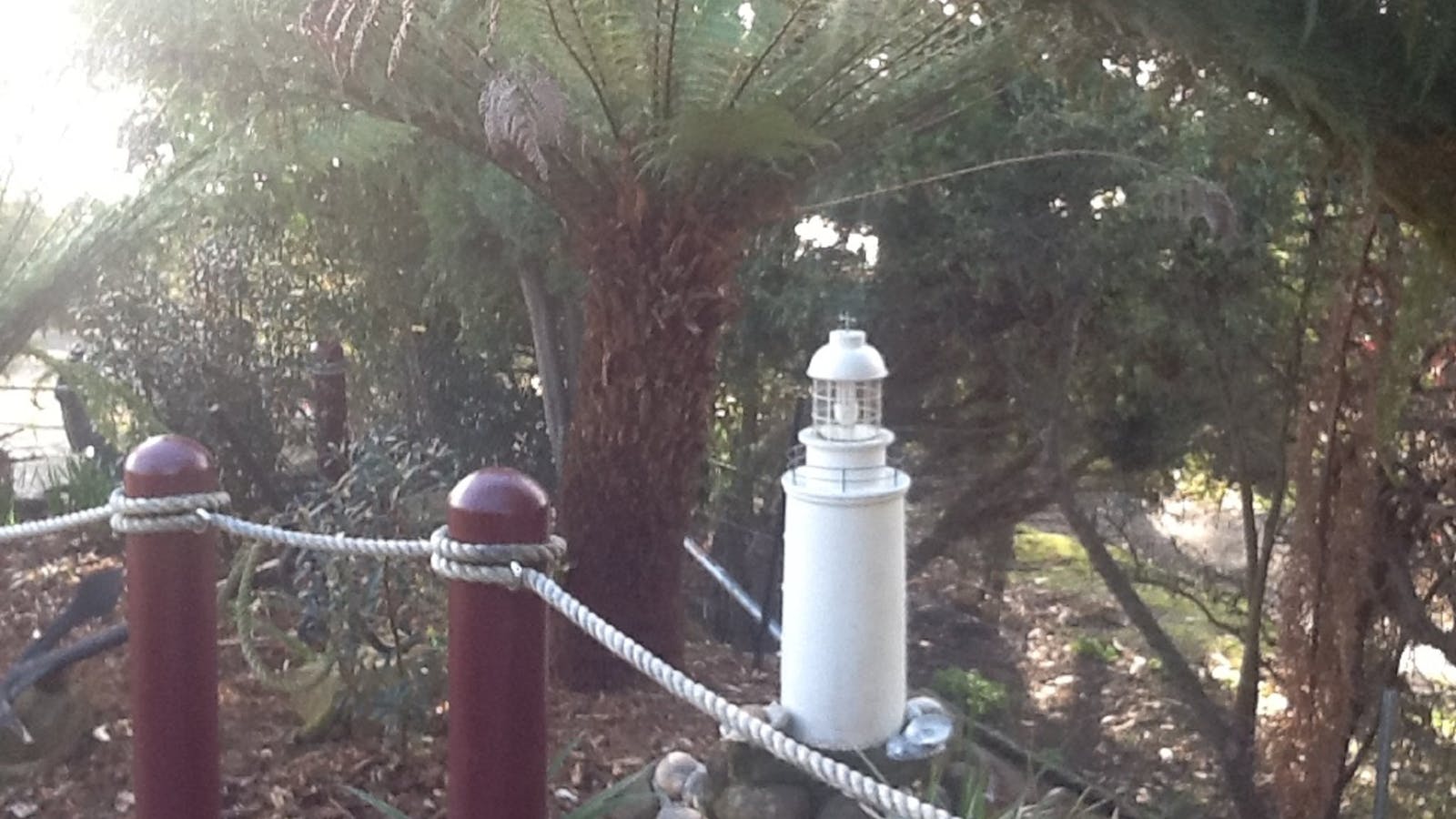 light house in front garden
