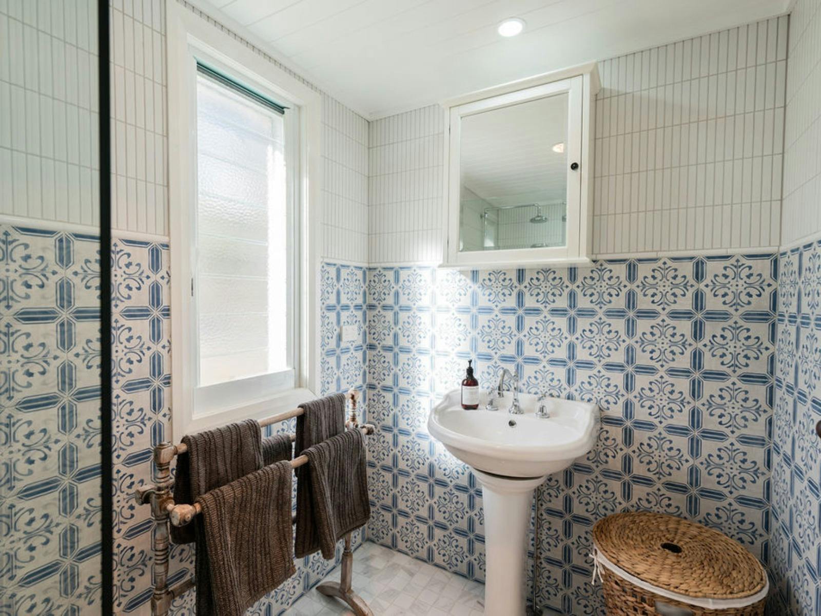 Bathroom sink, vanity and vintage towel rack