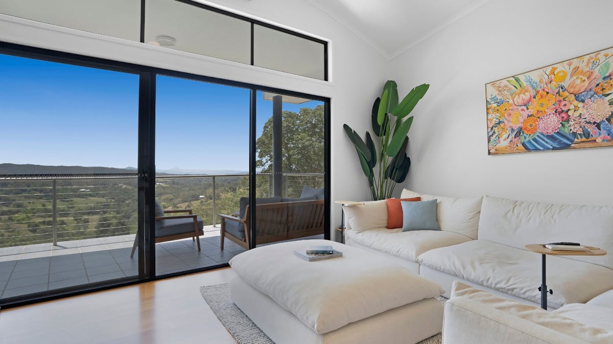 Living room with balcony access, Smart TV and indoor fireplace