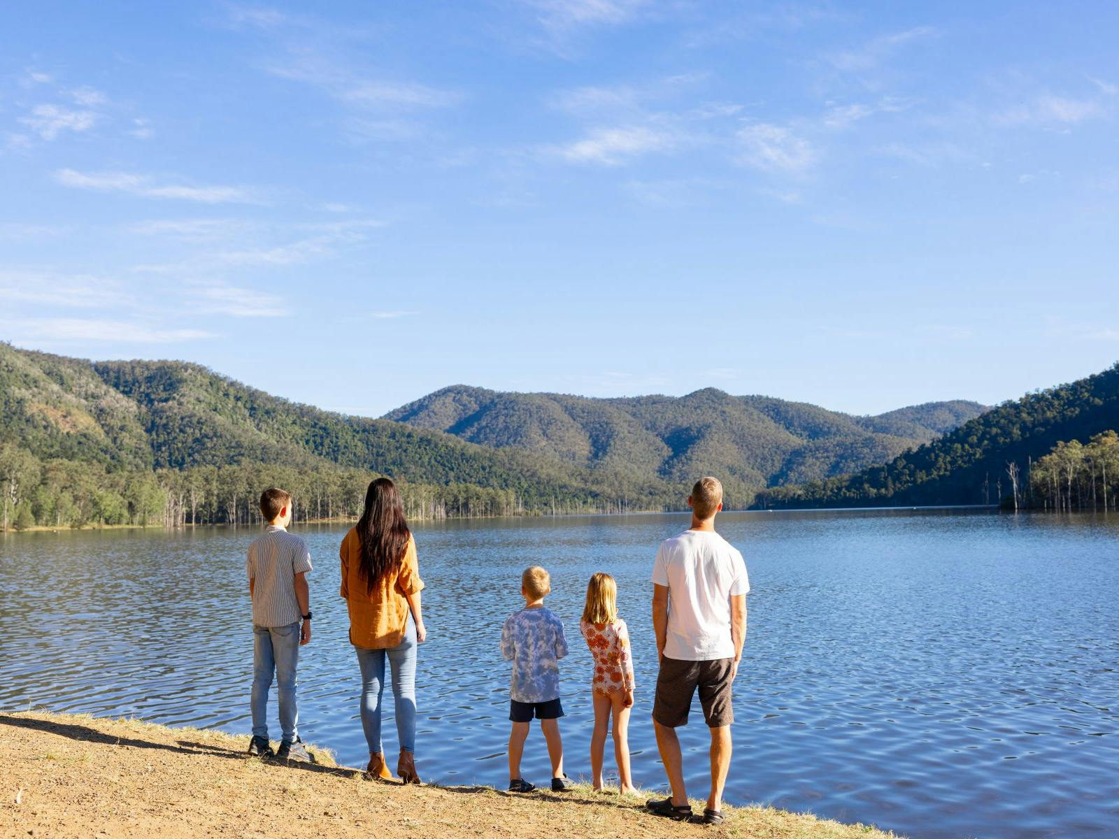 Family looking out at the dam Family looking out at the dam