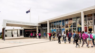 Group of school children arriving at the Canberra and Region Visitors Centre