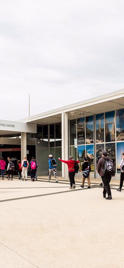 Group of school children arriving at the Canberra and Region Visitors Centre