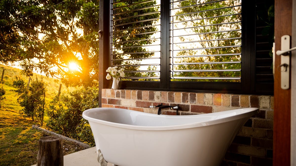 Relax and unwind in our outdoor bath. Soak in luxury Saya products
