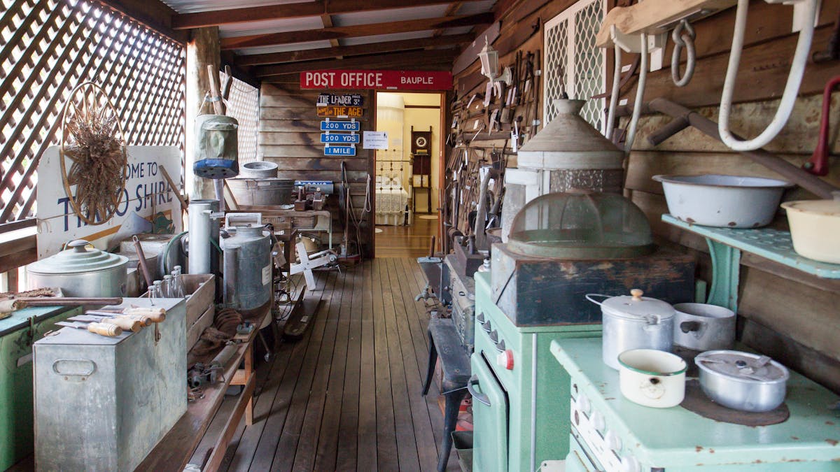 photo showing side verandah of Bauple Museum with old equipment. photo showing side verandah of Bauple Museum with old equipment.