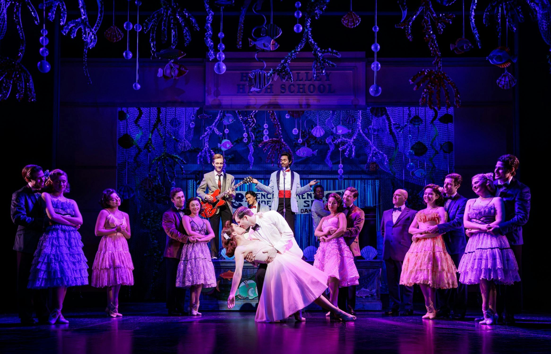 Lorraine and George McFly kiss at the school dance.