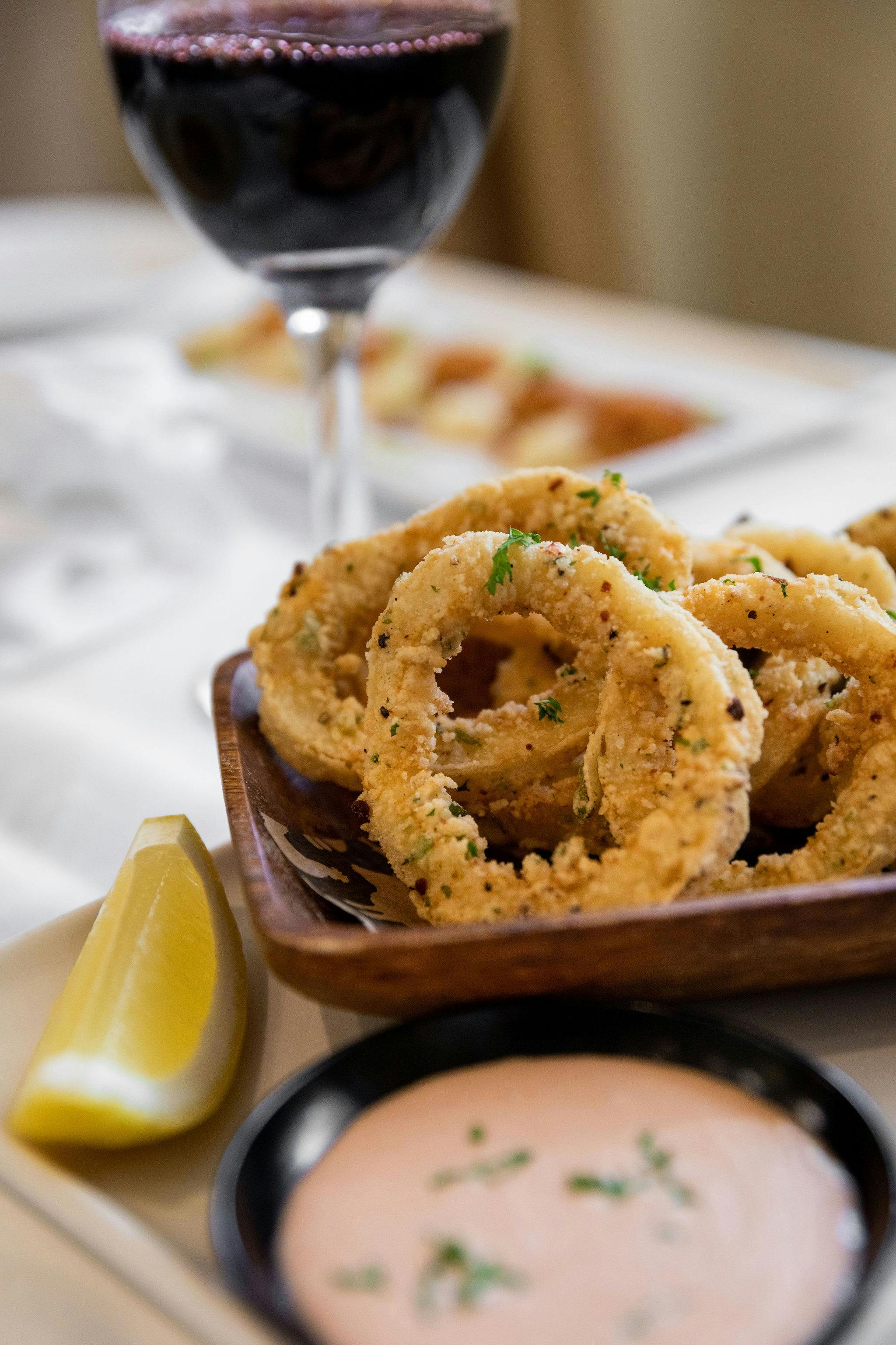Fried calamari dusted with onion, garlic, chilli flakes & semolina served with brandy infused Marie