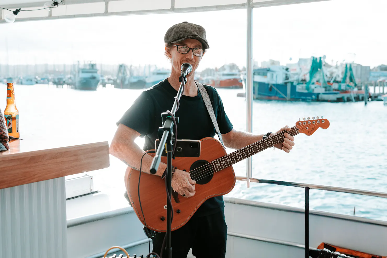 Live Musician playing onboard The Boat Mooloolaba