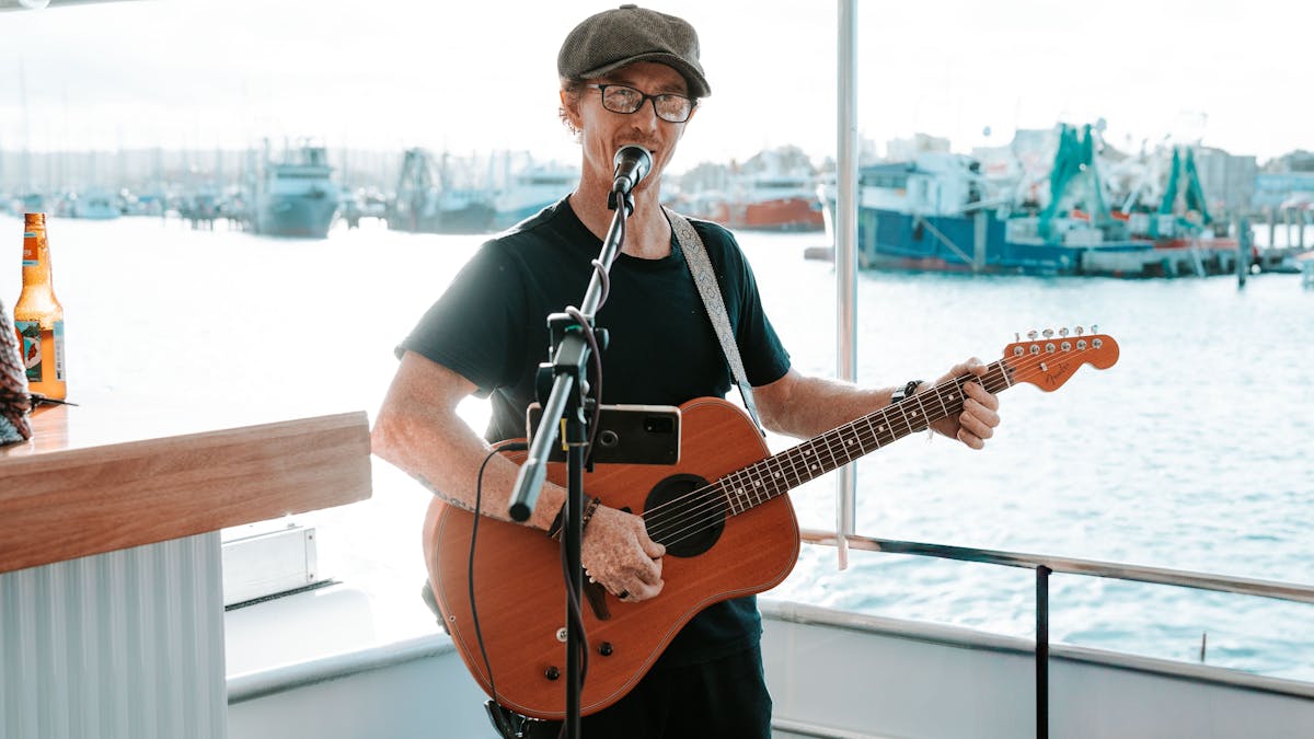 Live Musician playing onboard The Boat Mooloolaba