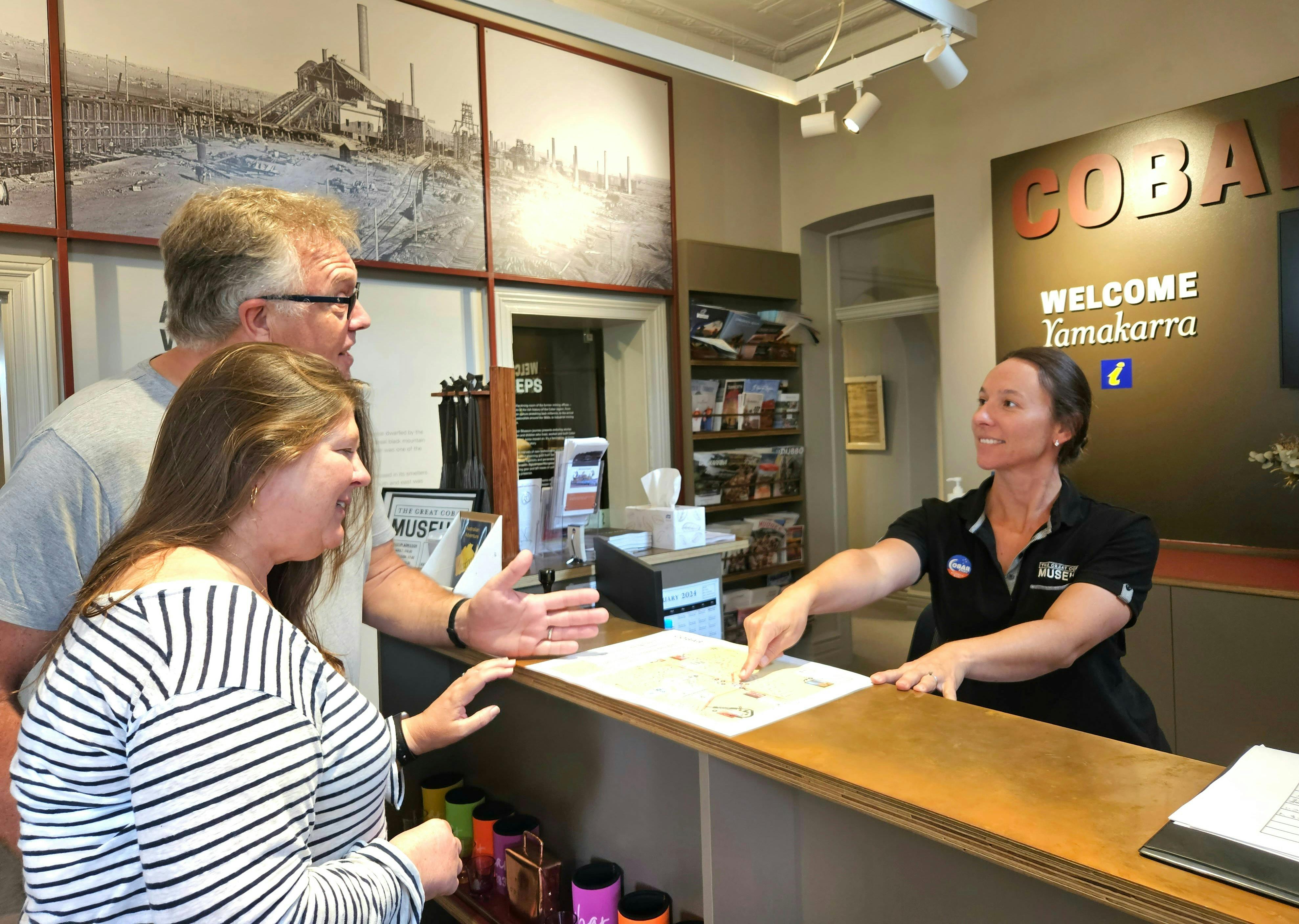 Friendly staff assisting visitors