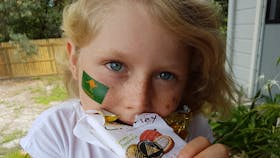 Child eating chocolate