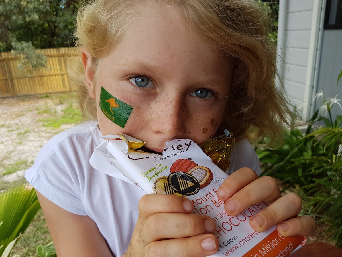 Child eating chocolate