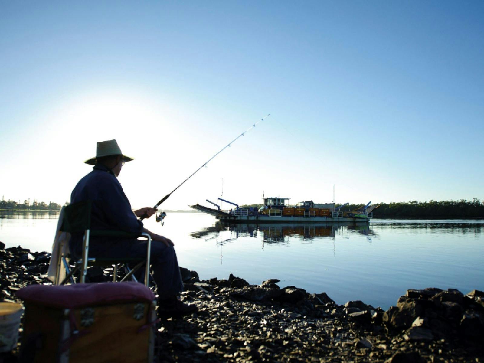 Man fishing at Burns Point Ferry Ballina