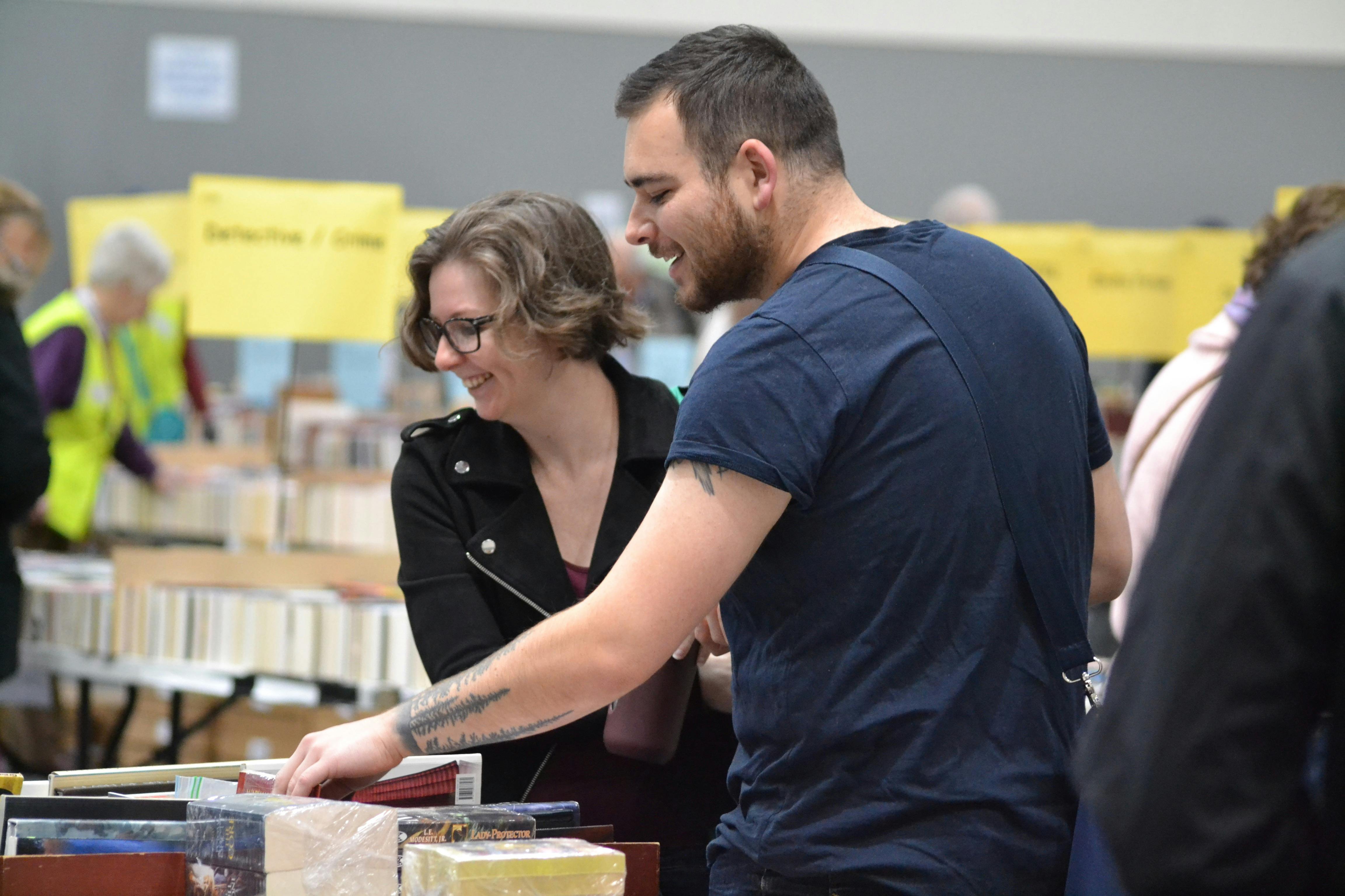 Two people enjoying the Lifeline Bookfair