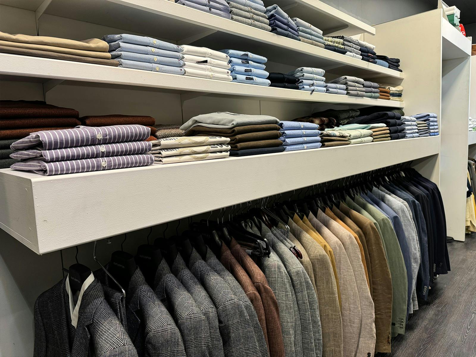 Inside view of shelves of Hartfords Menswear