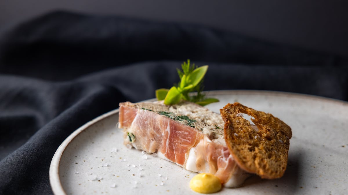 Chicken and duck terrine, pickled carrot emulsion, croute
