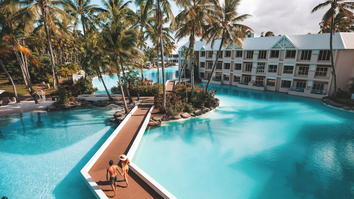 Walkways surrounded by sparkling blue lagoons