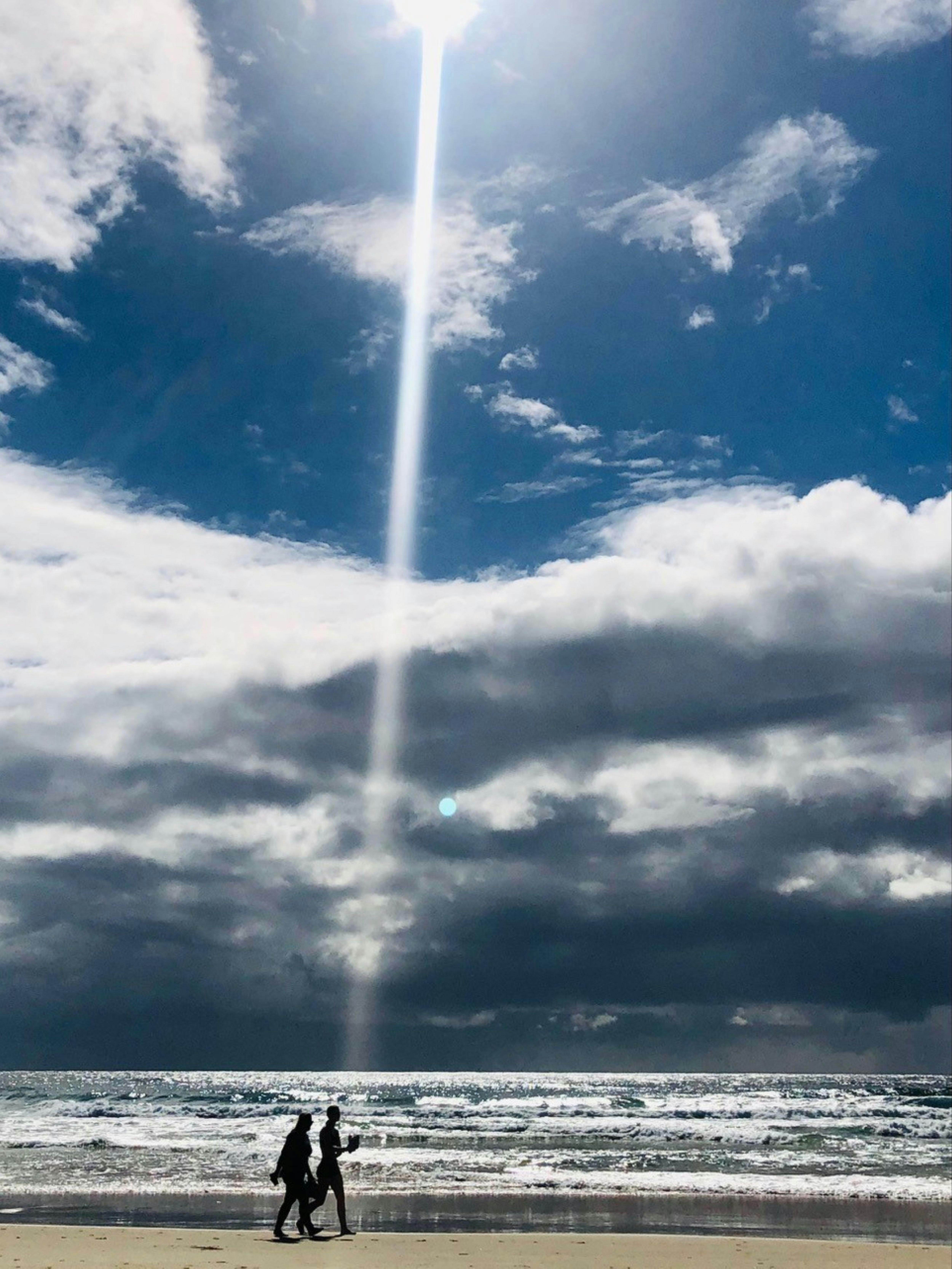 Barefoot Beach walking is better with some company , sunshine, a sea brezze and a few clouds