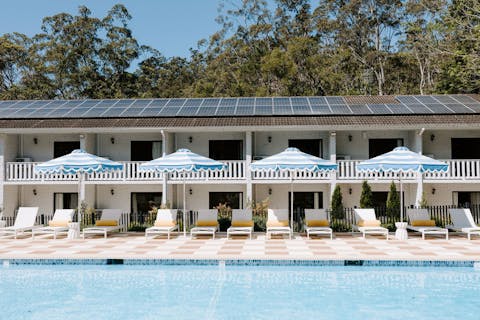 Umbrellas, deck chairs and the pool